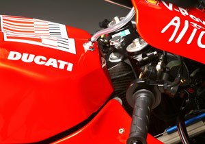 motorcycle com, Claudio Domenicali says MotoGP teams should start tightening their grips on expenses