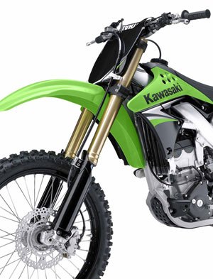 motorcycle com, Kawasaki reduced the fork off set by 1mm enlarged the wraparound tube guards and reshaped and stiffened the upper triple clamp