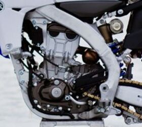 motorcycle racing on ice video, The YZ450F is unique because of the engine s rearward slant and inverse arrangement of its intake and exhaust compared to other models in its class Intake is located near the front of the bike while exhaust exits from the rear of the engine