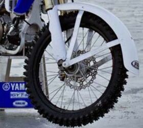 motorcycle racing on ice video, Nobody wants to be impaled by a metal screw in the event of a fall so fender extenders are required to reduce the danger