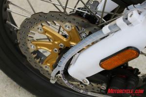 2010 electric motorcycle shootout motorcycle com, The Zero s proprietary brake rotor while artful and innovative seems incongruous to otherwise weak braking performance