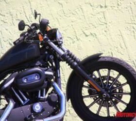 2009 harley davidson iron 883 review motorcycle com, Sharing the same Evolution 883cc V Twin found on the 883 Low this blackened Sportster is called the Iron 883 and hides a low price under all that attitude MSRP 7 899