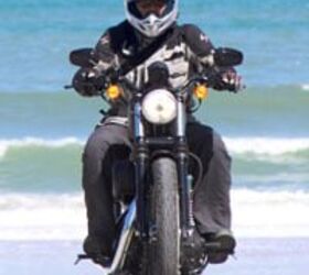 2009 harley davidson iron 883 review motorcycle com, Like a phoenix rising from the south Fonzie trades in the KLR for a Dark Custom and hits the strand looking for babes Sorry Fonz I don t see any girls in this picture Ed