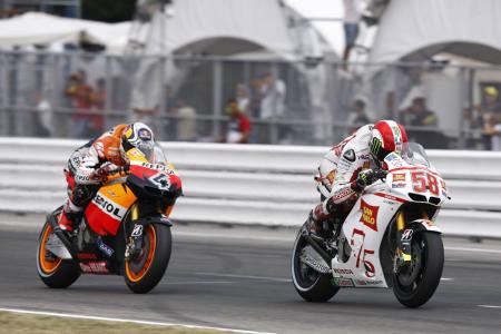 2011 motogp misano results, Local boy Marco Simoncelli outraced Andrea Dovizioso to take fourth place