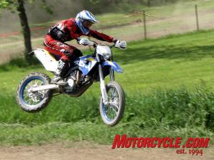 2010 husaberg fe570 review motorcycle com, It s soft Soft in the woods and soft on the track This bike could use stiffer forks springs in a big way