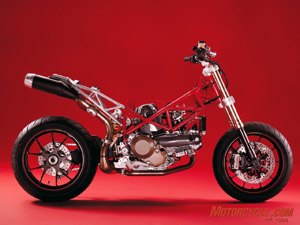 church of mo 2007 ducati hypermotard 1100s, Stripped Hypermotard shows its minimalist engine with wheels design that demonstrates effective mass centralization