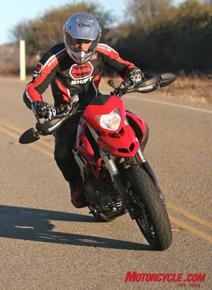 2007 ducati hypermotard 1100s motorcycle com, The front fender and small headlight pod offer little in terms of wind protection for the high set rider