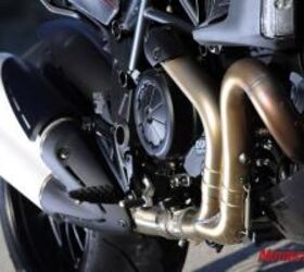 2011 ducati diavel review motorcycle com, Ducati says the Diavel s new exhaust is the key to extracting an extra 12 hp and 6 5 ft lbs from the Testastretta 11 engine