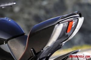 2011 ducati diavel review motorcycle com, The bold and unconventional style of Diavel s tail section is proof of Ducati s willingness to go its own way