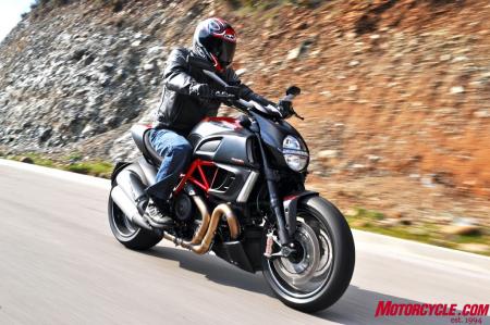 2011 ducati diavel review motorcycle com, The Diavel s long wheelbase as well as DTC if activated helps keep the front planted under hard launches but if you want to wheelie the Diavel is more than ready