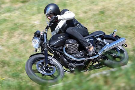 2012 moto guzzi v7 lineup review motorcycle com, If you re in the market for a V7 with attitude but don t want the committed ergos of the V7 Racer the V7 Stone is for you