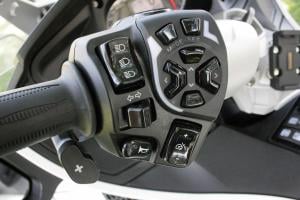 2011 can am spyder rt limited review video motorcycle com, From the paddle shifters to elevating the windscreen and interacting with the Spyder s ECU the left handlebar is a hub of activity