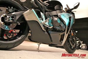 first look 2008 honda cbr1000rr motorcycle com, The new mid muffler exhaust certainly follows current trends of centralizing mass and keeping weight low but it also was important in meeting tighter emissions standards