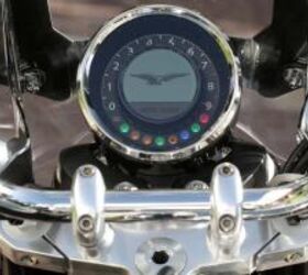 2013 moto guzzi california 1400 touring ambassador review motorcycle com, An analog tachometer surrounds the digital screen which displays speed and ambient temperature as well as ride mode and traction control settings