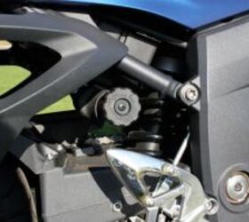 2011 triumph sprint gt review motorcycle com, This knob adjusts the rear spring preload