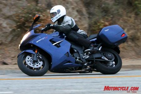 2011 triumph sprint gt review motorcycle com, With chain drive single sided swingarm large bags ABS and centerstand included the Sprint GT is an able bodied pavement scraper that encourages riders to keep dipping it lower