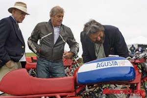 2008 legend of the motorcycle concours d elegance, Judges Jim Thomas l and Adolfo Orsi r along with Agostini inspect a 1973 MV Agusta Sport belonging to Yoshi Kosaka