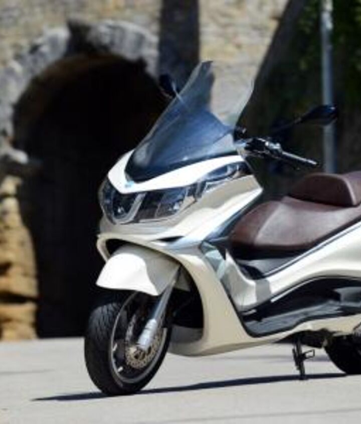 2012 piaggio x10 500 executive review motorcycle com, Piaggio s new X10 500 Executive touring scooter is a technological marvel