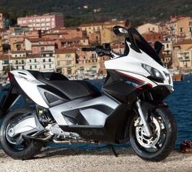 2012 piaggio x10 500 executive review motorcycle com, Compared to the Piaggio X10 500 Executive the Aprilia SRV 850 offers sportier handling more akin to a motorcycle