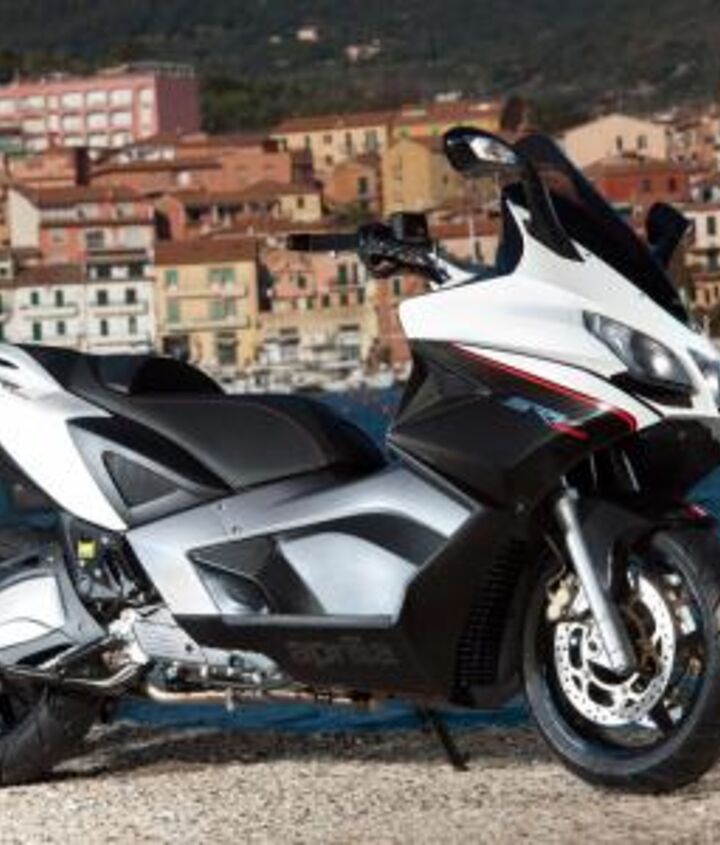 2012 piaggio x10 500 executive review motorcycle com, Compared to the Piaggio X10 500 Executive the Aprilia SRV 850 offers sportier handling more akin to a motorcycle
