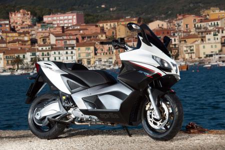 2012 piaggio x10 500 executive review motorcycle com, Compared to the Piaggio X10 500 Executive the Aprilia SRV 850 offers sportier handling more akin to a motorcycle