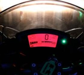 2010 kawasaki ninja 650r review motorcycle com, After dark illuminated instruments glow dark red