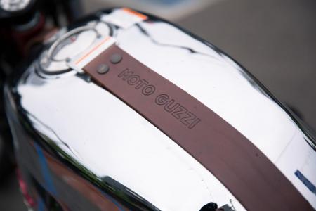 2013 moto guzzi v7 racer review motorcycle com, Is this awesome leather tank strap functional Do you really care