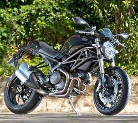 2011 ducati monster 1100 evo review motorcycle com, 2011 Monster 1100 EVO The Monster 1100 receives ABS traction control lighter wheels and an extra 5 hp as part of the EVO upgrade And it doesn t cost a penny more than the 2010 base model Monster 1100