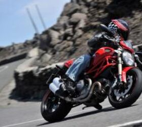 2011 ducati monster 1100 evo review motorcycle com, The new Marzocchi fork has excellent damping allowing a rider to fully exploit the Pirelli Diablo Rosso II front tire s improved grip