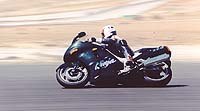 open superbikes 1997 motorcycle com, The ZX is much happier sport touring than it is racing