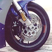 open superbikes 1997 motorcycle com, Upside down forks and six piston brakes combined to make the GSXR our most stable and hardest stopping racetrack weapon