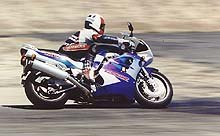 open superbikes 1997 motorcycle com, Chuck Graves has considerable experience racing GSXRs so we weren t surprised when he turned smoking laps on the 1100