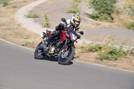2012 bajaj pulsar 200ns review motorcycle com, Seating on the 200NS is fairly upright and comfortable even for a tall rider