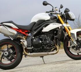 best motorcycles of 2012 motorcycle com, The Speed Triple R is comfortable and accommodating to ride has a top shelf suspension and is a riot to ride nearly everywhere It s also more fetching than that pesky Tuono bumblebee