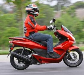 best motorcycles of 2012 motorcycle com, In college Looking for cheap practical transportation that can hold all your things Say hello to the Honda PCX150
