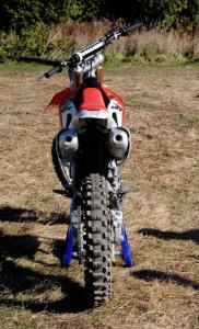 2013 honda crf450r review motorcycle com, New for 2013 is a dual exhaust system which runs at a quiet 94db