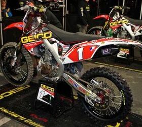 inside the 2013 supercross works bikes motorcycle com, Eli Tomac s Honda CRF250 runs a single exhaust unlike his 450 teammates Tomac says the single pipe gives him more bottom end and midrange power that he and his teammates like for supercross