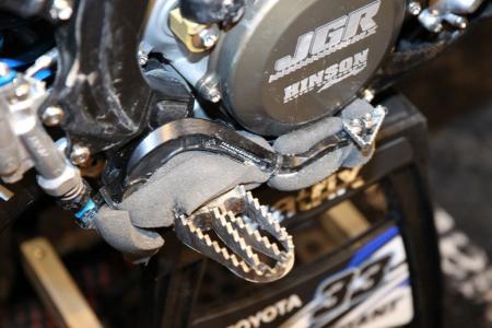 inside the 2013 supercross works bikes motorcycle com, Baggett s mechanic prefers to run fine coarse foam under the brake pedal to make sure nothing interferes with its action