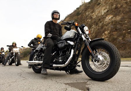 2010 harley davidson forty eight unveiled, The 26 inch seat height under mounted mirrors and slammed rear suspension give the Forty Eight a low profile