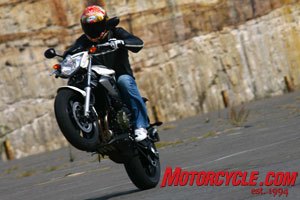 2009 yamaha xj6 xj6 diversion review motorcycle com, First gear easily allows for some air underneath that front tire