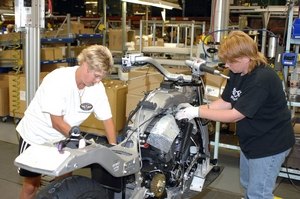 2008 victory vision first ride motorcycle com, The Vision s skeleton is on display during assembly at the Victory factory Note the large cast aluminum backbone that is claimed to yield a 25 reduction of weight compared to a steel frame