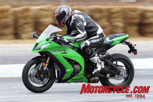 2011 kawasaki zx 10r review motorcycle com, The new 10 is bloomin powerful I often found myself climbing the tank to keep from getting jettisoned off the back