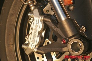 2008 ducati 848 road test motorcycle com, Two piece Brembo calipers are radially mounted to the inverted Showa fork Though lower spec items compared to the 1098 s monobloc design they provide plenty of power without a harsh initial bite