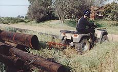atv test 1997 honda foreman 400 motorcycle com, Working the Ranch