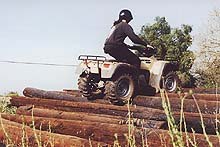 atv test 1997 honda foreman 400 motorcycle com, Foreman 400 claws its way up uneven surfaces