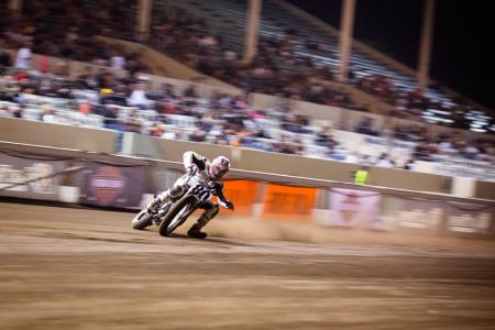 2012 ama flat track season finale video, Steve Bonsey throwing his XR750 sideways into Turn 1 at Pomona on his way to winning the second Heat race