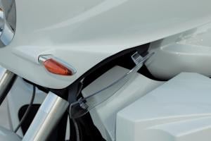 2012 victory cross country tour review motorcycle com, This is the clear adjustable wind deflector on the front fairing The deflectors provide a wide range of adjustment