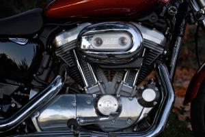 2012 harley davidson sportster superlow vs triumph america video motorcycle com, The SuperLow s 883cc air cooled fuel injected V Twin is a well known engine