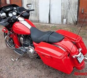 2010 harley davidson road glide custom review motorcycle com, Live out your fireman fantasies on this Scarlet Red Vivid Black Road Glide Custom a 480 option over the base Vivid Black paintwork