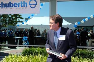 schuberth north america opens its doors, Tim Buche approaches with MIC membership plaque to present to Lejeune